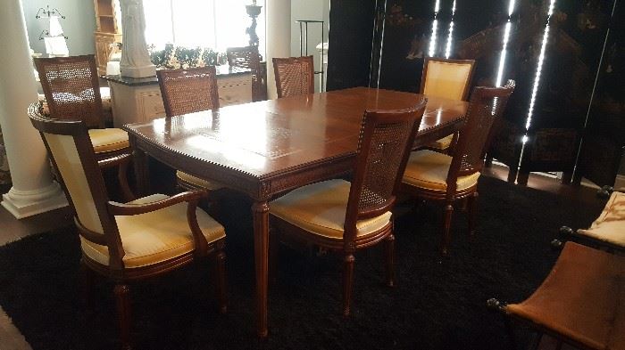 Mid Century Dining Table with 3 leaves by Davis. 6 Side Chairs and 2 Arm Chairs.