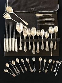 79 piece sterling silver  flatware set. Several small pieces from around the world. 