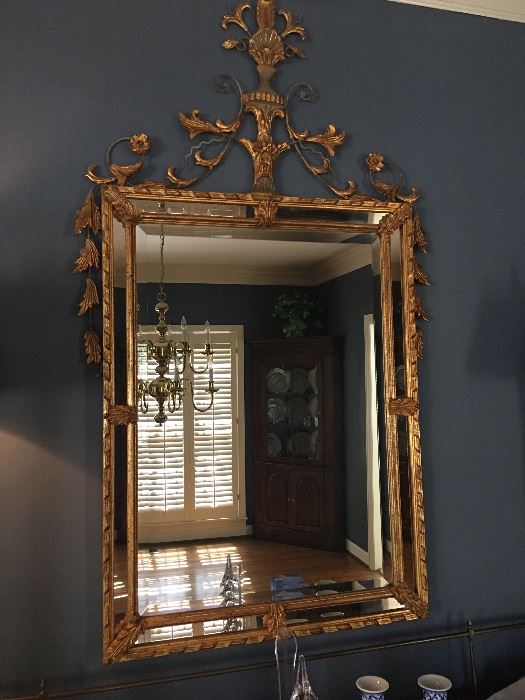 A very nice gold gilded large ornate mirror