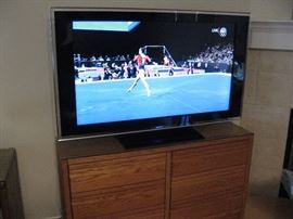 52" Sony Flat Screen Bravia, Sitting on a Six Drawer Oak Chest...