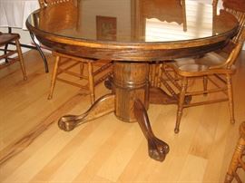 Oak Claw Foot Table with Three Leaves and Eight Chairs...