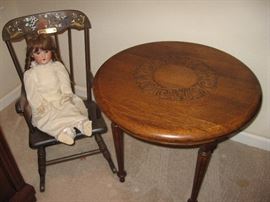 Round Side Table with Carving on Top, One of the Two Vintage Rockers, One of the Two Vintage Dolls...