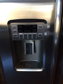Water and Ice dispenser on refrigerator 