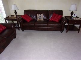 Leather sofa and loveseat. Broyhill end tables