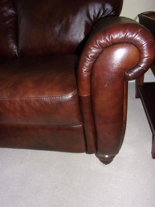 Leather sofa and loveseat. Broyhill end tables