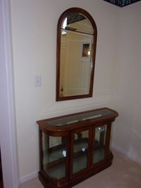 Curio entry table with beveled edge mirror