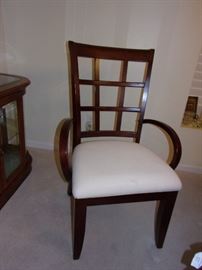 Klaussner dining room table with 6 chairs(2 are captain) 2 drawers, leaf and pad/table protector and matching china cabinet- Contemporary look