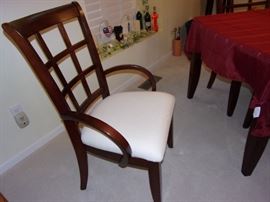 Klaussner dining room table with 6 chairs(2 are captain) 2 drawers, leaf and pad/table protector and matching china cabinet- Contemporary look