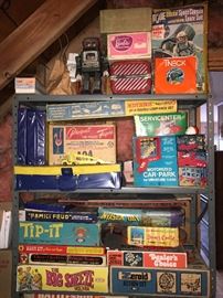 Tons and tons of vintage games and toys. GI Joe Space Capsule, ALPS tin toy TV spaceman, Matchbox racetrack, Barbie, Marx Toys Invasion Day Play set, Disney Castle See & Play, Zeroid Action set, The Big Sneeze and much, much more!