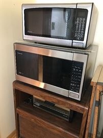Microwaves and kitchen cart