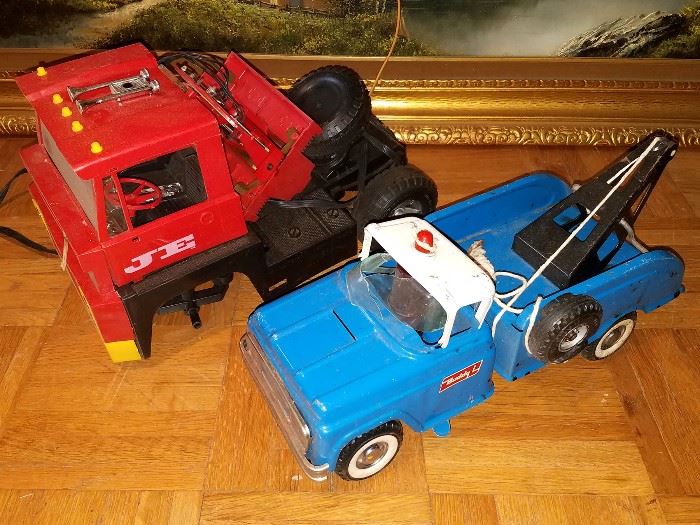 Vintage metal toy trucks and such