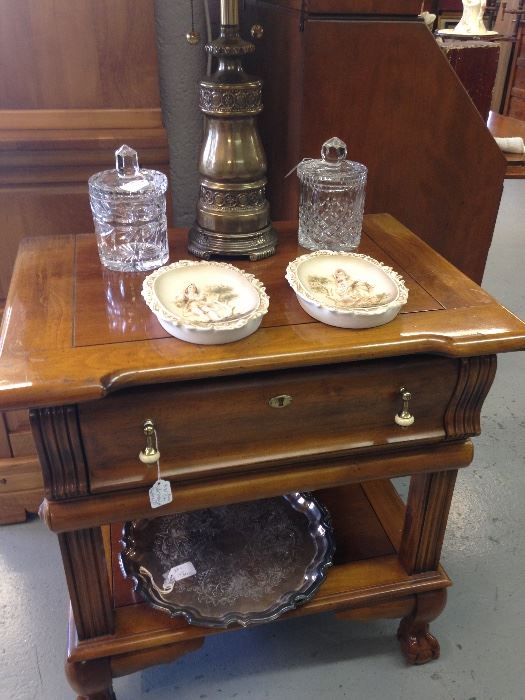 Beautiful side table. Serving trays. Crystal Cracker jars with lids