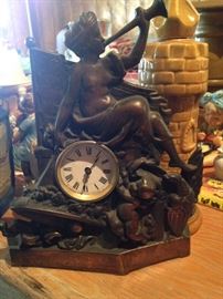 Look at this beautiful Iron Clock with Cherub and horn