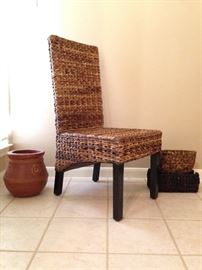 Indonesian Style Woven Accent Chair:  $75.00  Terra Cotta Pot:  $9.00  Woven Black 3 partition basket: $6.00  Canoe Shape Woven Basket:  $6.00