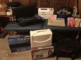 and still another sewing machine, vintage typewriter