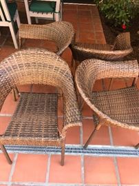 4 woven outdoor chairs - loads of potted plants
