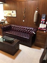 Vintage Trunks, rope Bouy, Chesterfield Sofa, African standing platter, pair of wooden locking file cabinets, macrame hanging, flags!