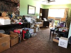 Trying or organize boxes from garage, attic, basement and garage.
