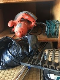 Assorted shop tools, hand saw