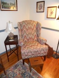 Wing back chair with flame stitch fabric