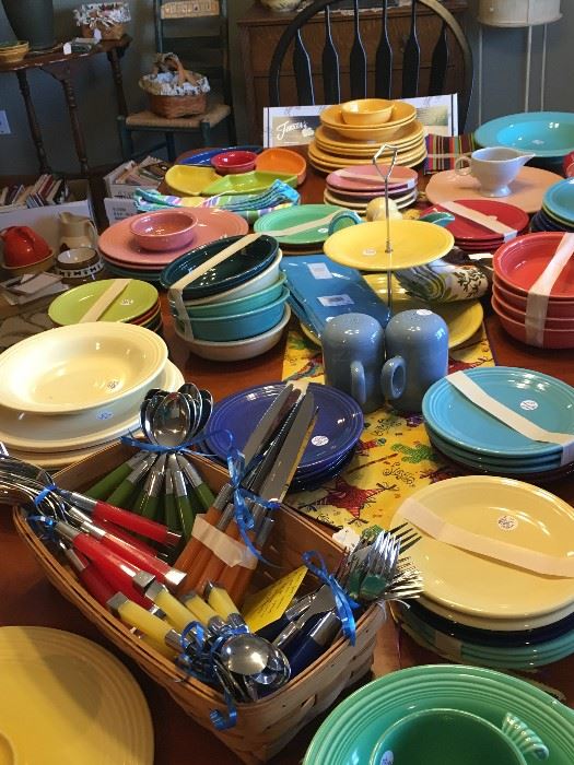 Lots of Fiesta dinnerware and serving pieces