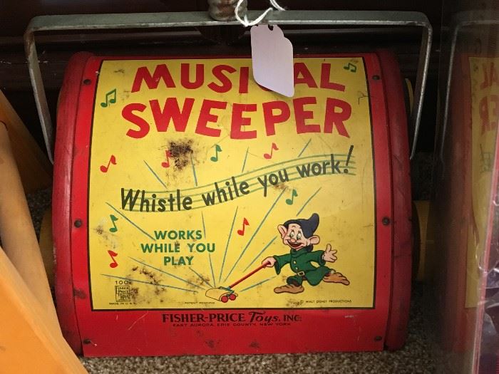 Early Fisher-Price Musical Sweeper with Dopey figure