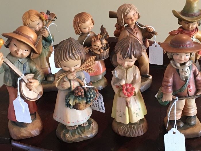 A collection of Anri Italian hand-carved figurines