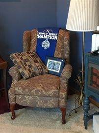 Nice wing-back patterned recliner.