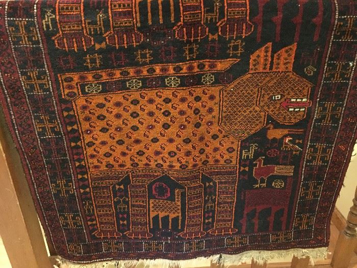 Antique hand woven rug with animal/bird design