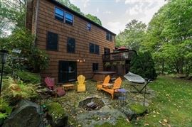 Baldwin Red Cedar Outdoor Furniture, Metal tables and hammock.