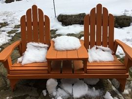 Baldwin Red Cedar 2 seater with center table. Table has hole for umbrella.