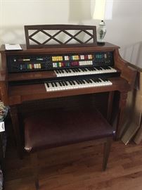 LOWREY Symphonic Holiday organ with Upper Lower Board keyboard;  with bench and starter music books