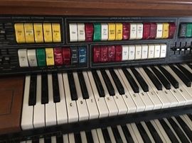 LOWREY Symphonic Holiday organ with Upper Lower Board keyboard;  with bench and starter music books
