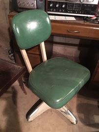Vintage leather desk chair on wheels
