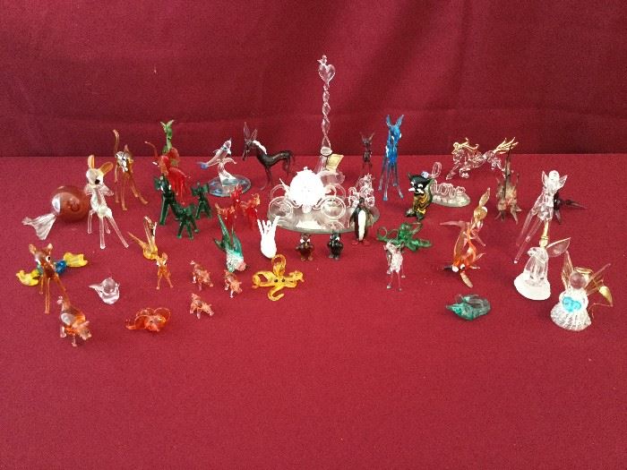 Miniature Glass Figurines  https://www.ctbids.com/#!/description/share/7347
