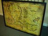 LORD OF THE RINGS MAP OF THE MIDDLE EARTH PROFESSIONALLY FRAMED AND READY TO HANG IN BLACK METAL FRAME. Comes with shipping crate for easy and safe moving.