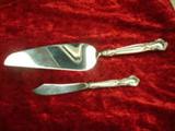 STERLING SILVER - Gorham. The Handles are Sterling Silver and the blades are stainless steel. Approx. weight 142 grams