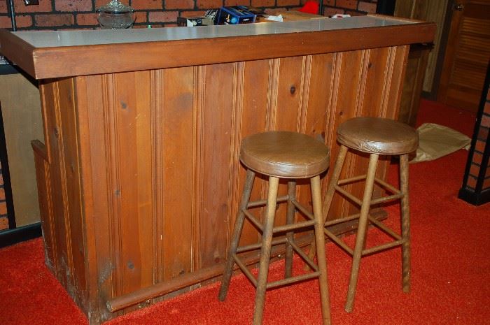 Bar with foot rest