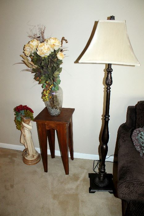 Floor lamp, floral arrangement, chalkware statue, small wood table