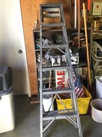 general maintenace supplies and an aluminum ladder...