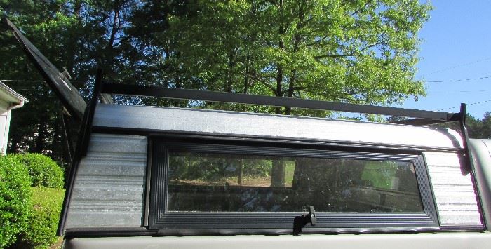 6' GM/Chevrolet Camper Shell with ladder rack on top. In very good condition. Item will not be at the sale during the sale for you to physically see. Item will be available to see or pick up on Sunday, June 24. Contact me if interested.  Interested buyer can pay at sale.