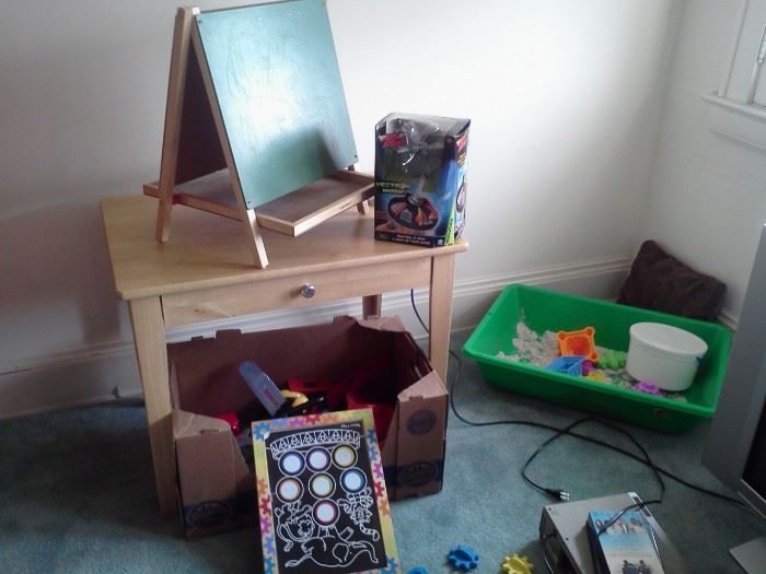 childs desk, sandbox, easel