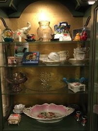 Upper cabinet of glass and porcelain goodies