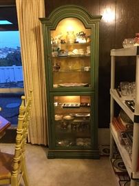 The green display cabinet with two locking doors, both lighted, key included