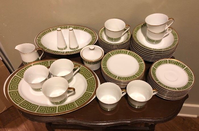 1960s eight-piece place setting "Imperial Deluxe" by Sango with olive green Greek key design and gilt trim.