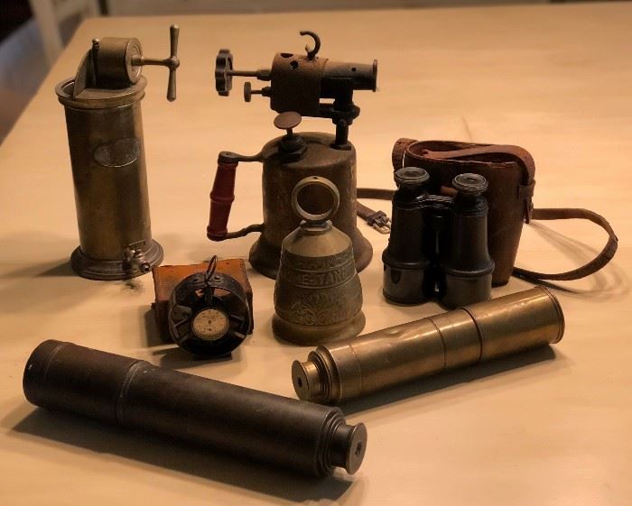 Brass telescoping looking glasses, antique torch, several pair of binoculars...