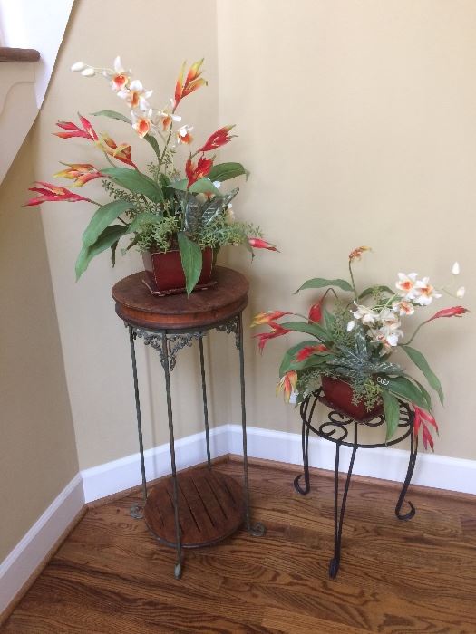 faux tropical flowers with plant stands
