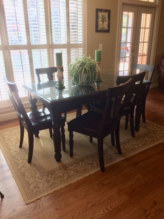 Pottery Barn casual dining table with glass top, six side chairs