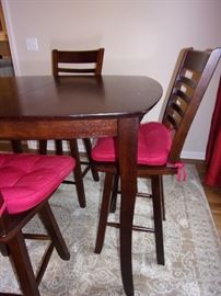 Counter height table and 4 swivel chairs with built in leaf excellent condition, Large neutral area rug