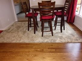 Counter height table and 4 swivel chairs with built in leaf excellent condition, Large neutral area rug